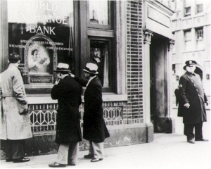 A NYC Police Officer stands guard at the closed World Exchange Bank building in March 1931. 